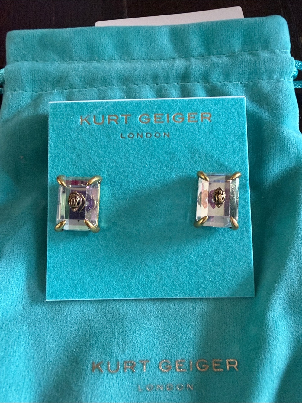 Kurt Geiger iridescent clear crystal stud earrings with gold-tone prongs